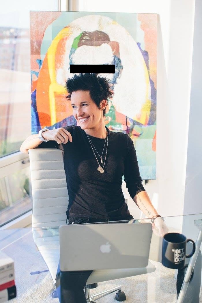 Amanda Hite smiling at her desk